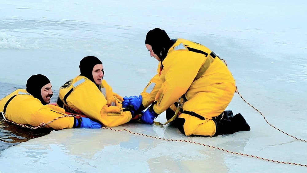 Fort McCoy firefighters train to save people clinging to ice with surface ice rescue training