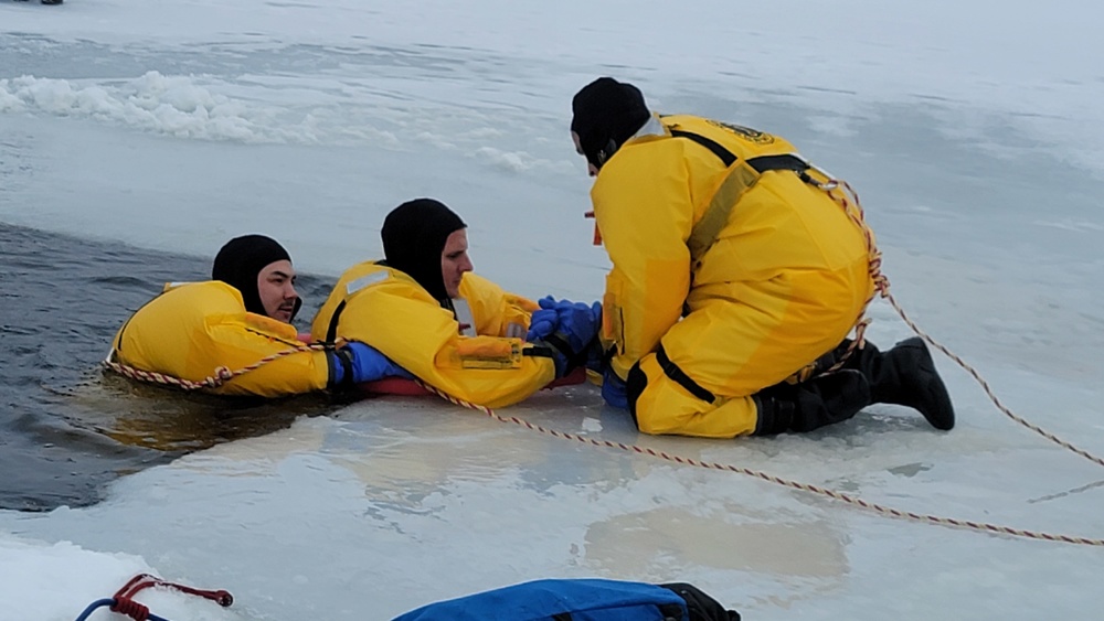 Fort McCoy firefighters train to save people clinging to ice with surface ice rescue training