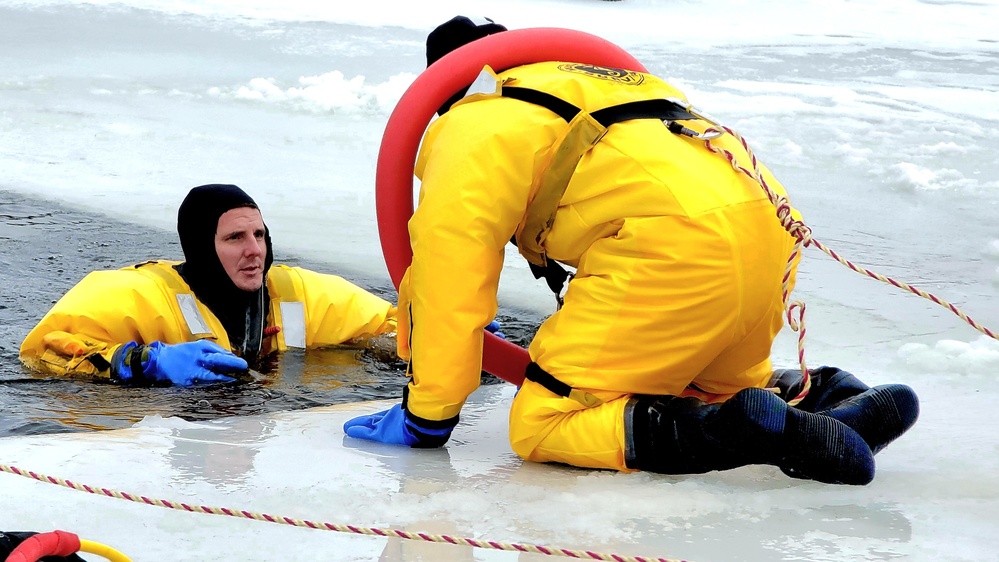 Fort McCoy firefighters train to save people clinging to ice with surface ice rescue training