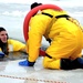 Fort McCoy firefighters train to save people clinging to ice with surface ice rescue training