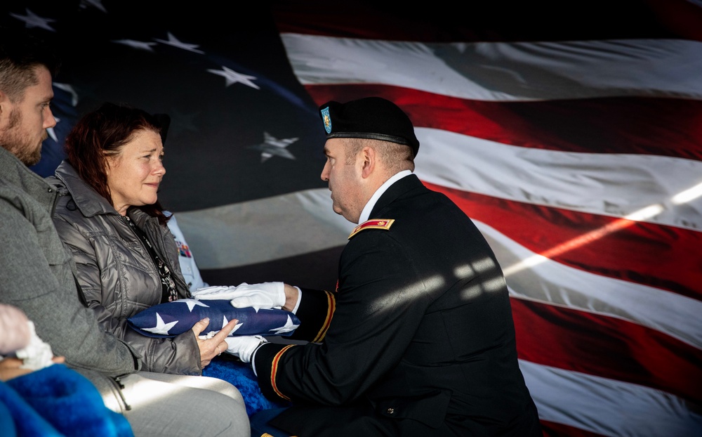 Widow of fallen Iowa Soldier is presented American flag