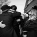 Iowa Soldiers embrace after memorial service