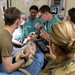 68T10 Animal Care Specialist students perform oral care on canines