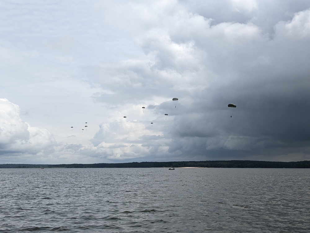 Soldiers from the 95th Civil Affairs Brigade (SO)(A) conduct a water jump at Mott Lake