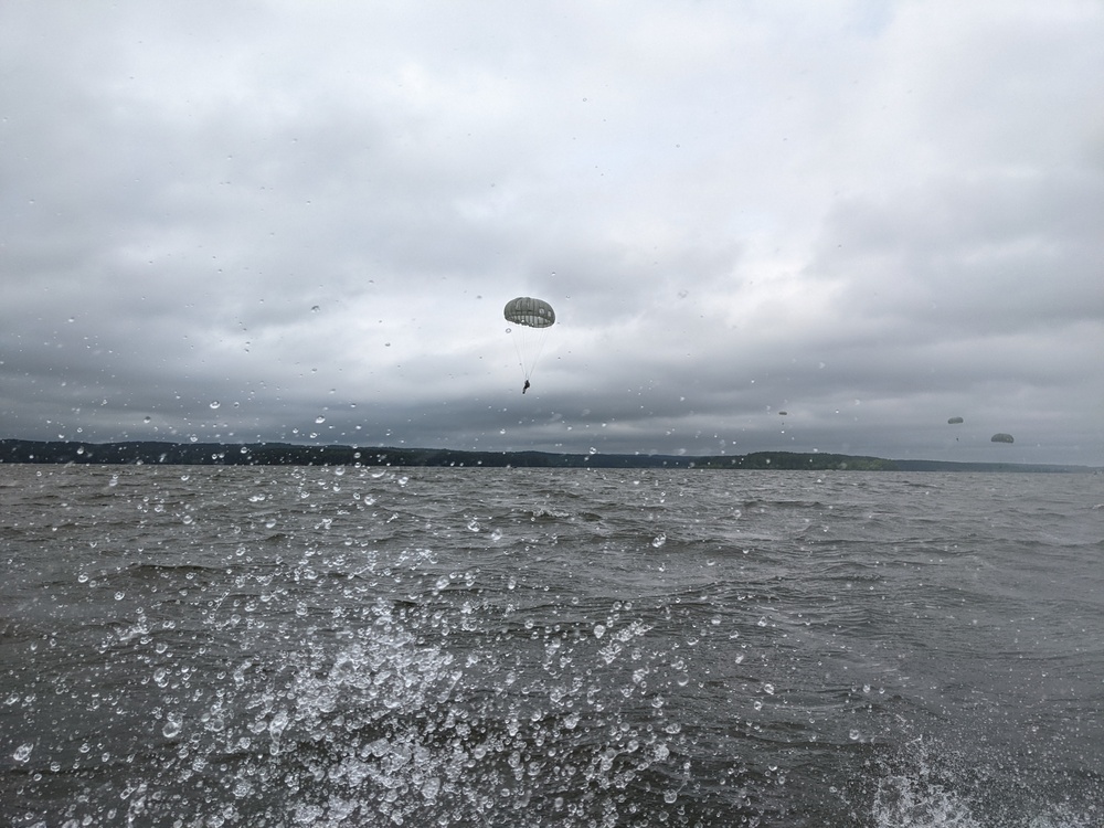 Soldiers from the 95th Civil Affairs Brigade (SO)(A) conduct a water jump at Mott Lake