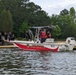 Soldiers from the 95th Civil Affairs Brigade (SO)(A) conduct a water jump at Mott Lake