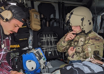 Soldiers from the 95th Civil Affairs Brigade (SO)(A) conduct a water jump at Mott Lake