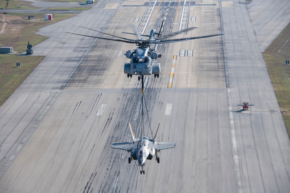 Non-flyable F-35C airframe lifted by CH-53K