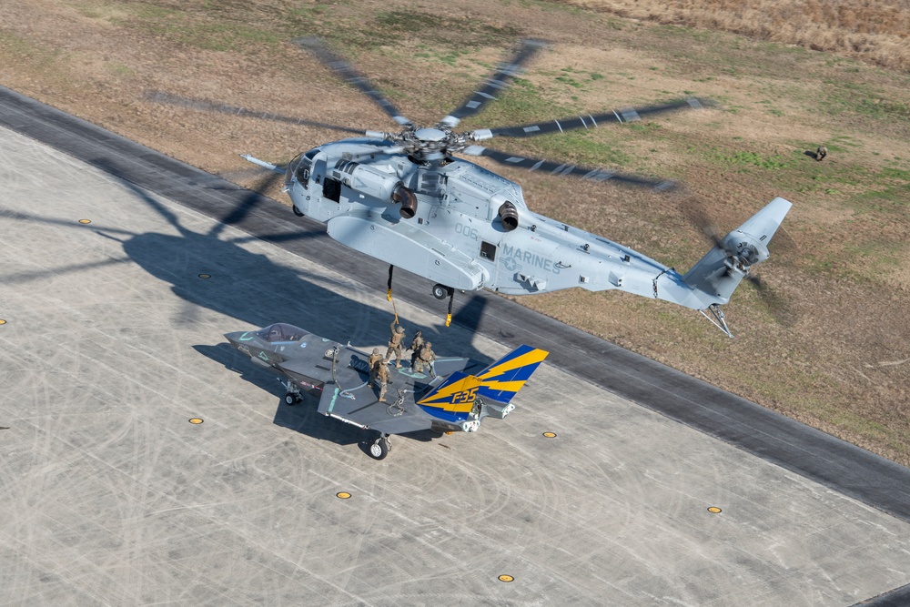 Non-flyable F-35C airframe lifted by CH-53K