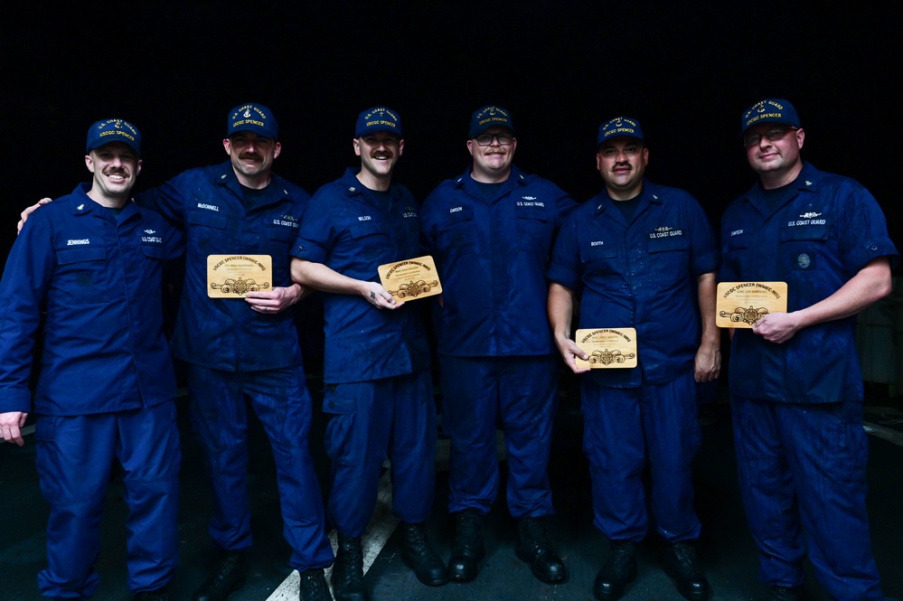 USCGC Spencer's crew gathers for a Cutterman ceremony