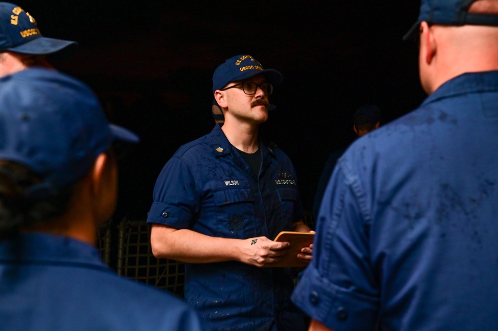 USCGC Spencer's crew gathers for a Cutterman ceremony