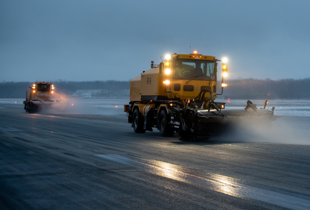 Base snow-removal team clears flightline