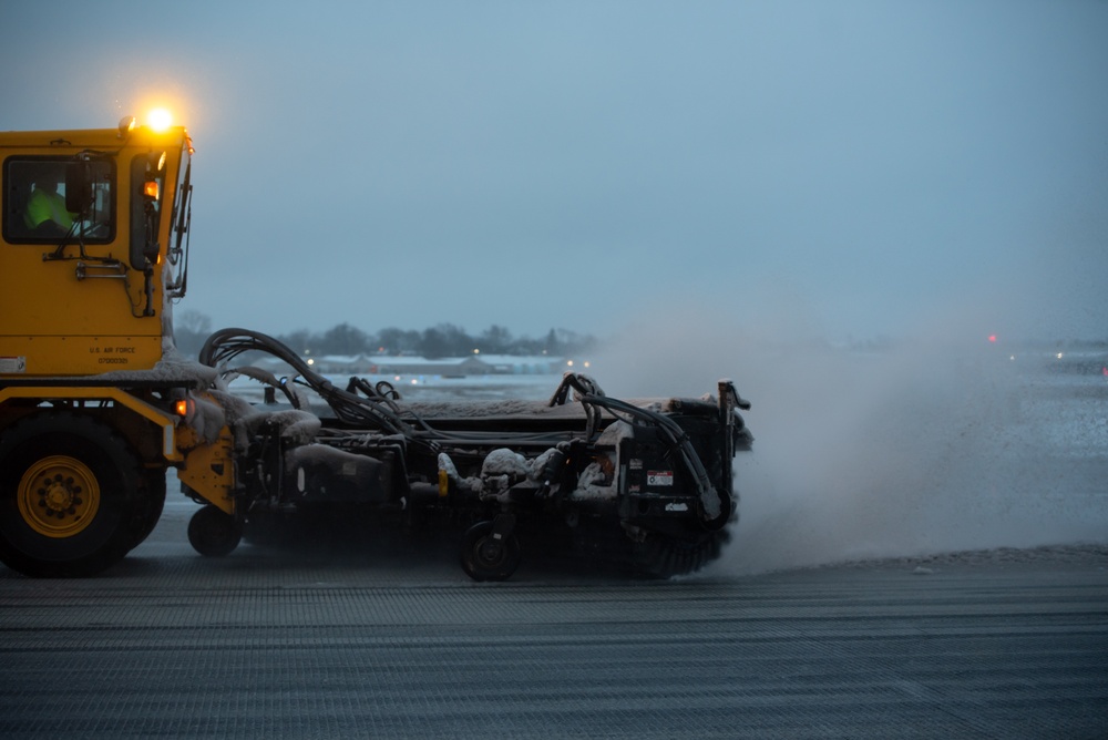 Base snow-removal team clears flightline