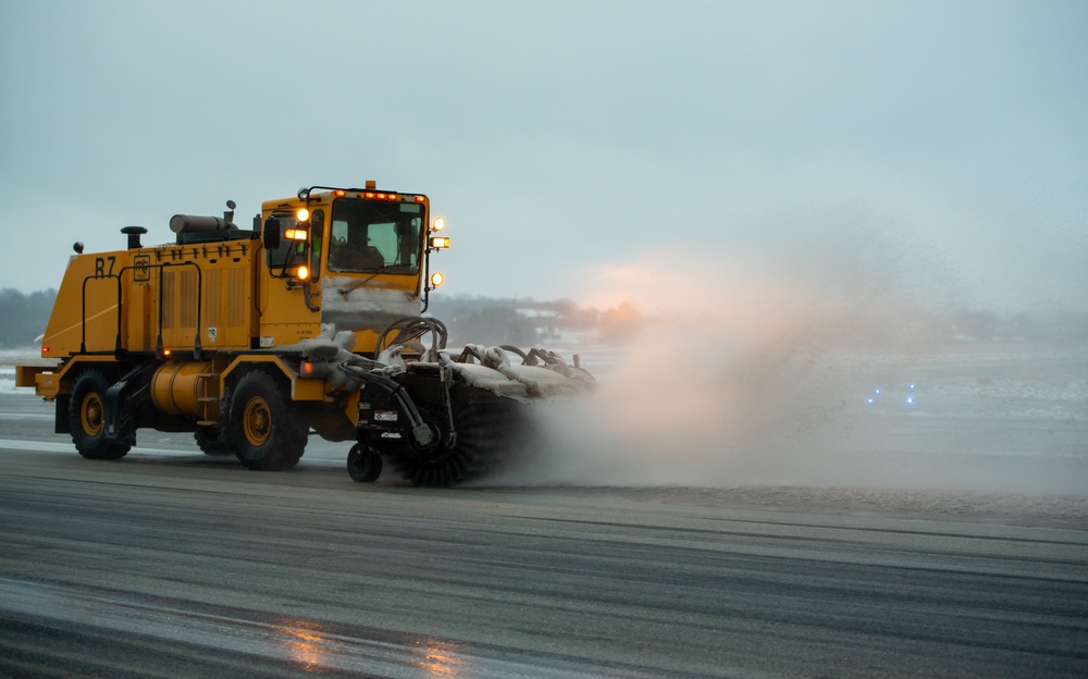 Base snow-removal team clears flightline