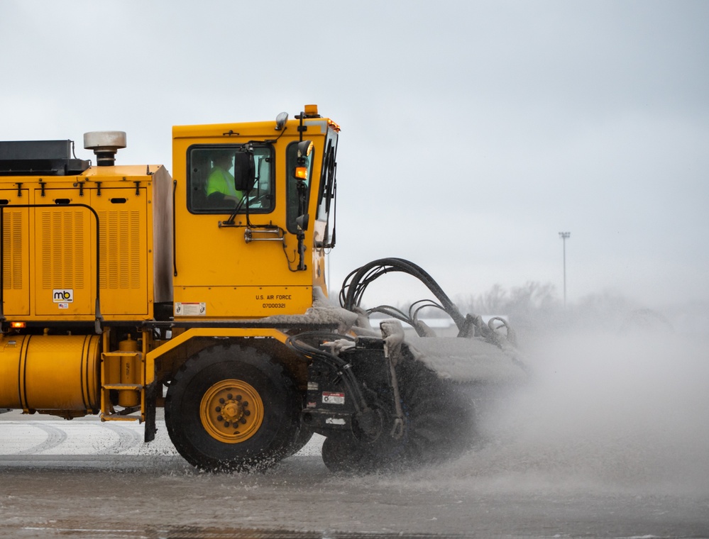 Base snow-removal team clears flightline