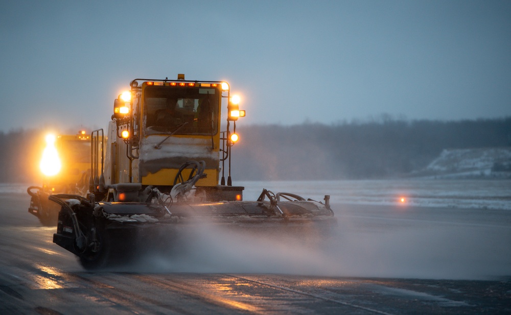 Base snow-removal team clears flightline