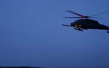 Alaska Air National Guardsmen conduct a medical evacuation at night