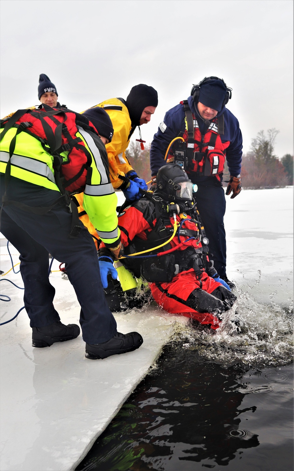 Fort McCoy Fire Department dive team conducts ice rescue training at frozen lake at Fort McCoy