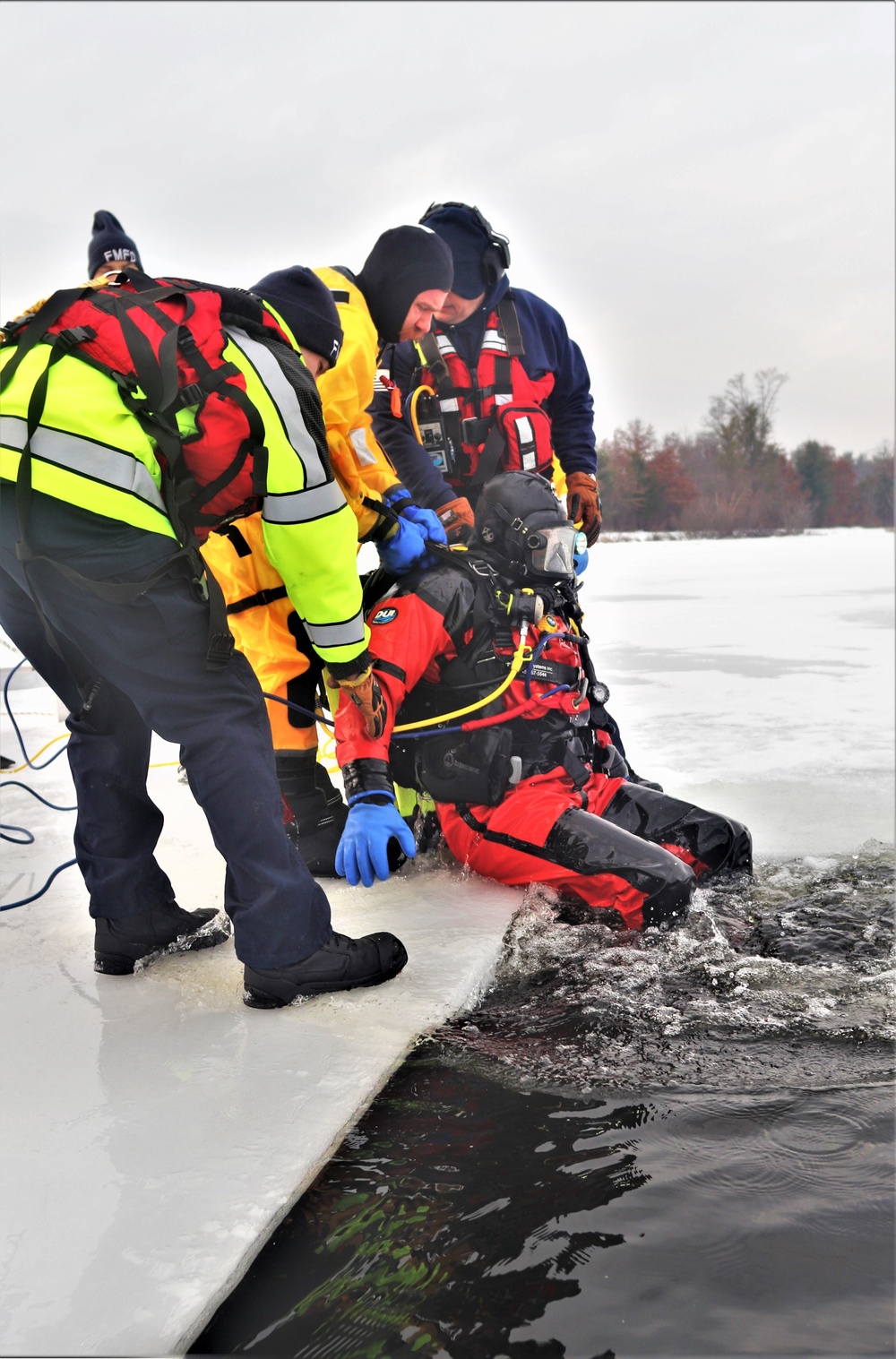 Fort McCoy Fire Department dive team conducts ice rescue training at frozen lake at Fort McCoy