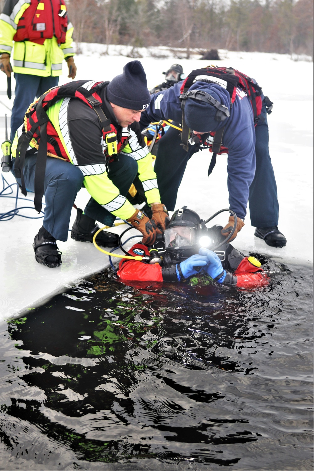 Fort McCoy Fire Department dive team conducts ice rescue training at frozen lake at Fort McCoy