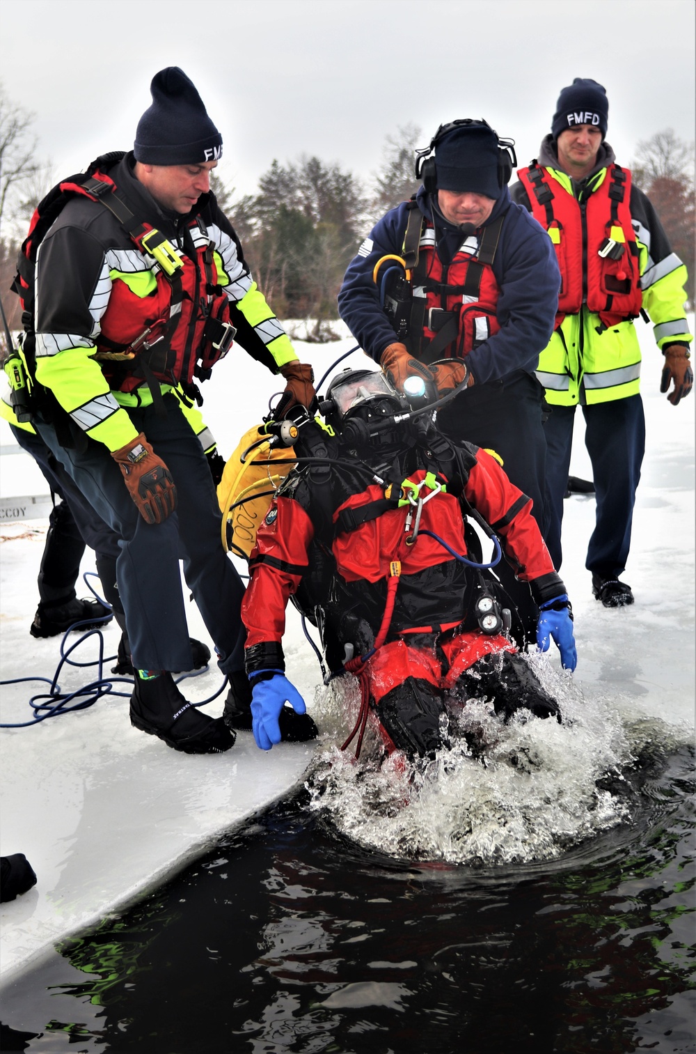 Fort McCoy Fire Department dive team conducts ice rescue training at frozen lake at Fort McCoy