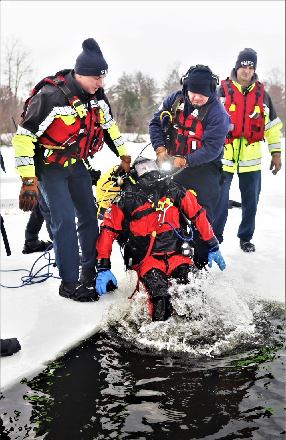 Fort McCoy Fire Department dive team conducts ice rescue training at frozen lake at Fort McCoy