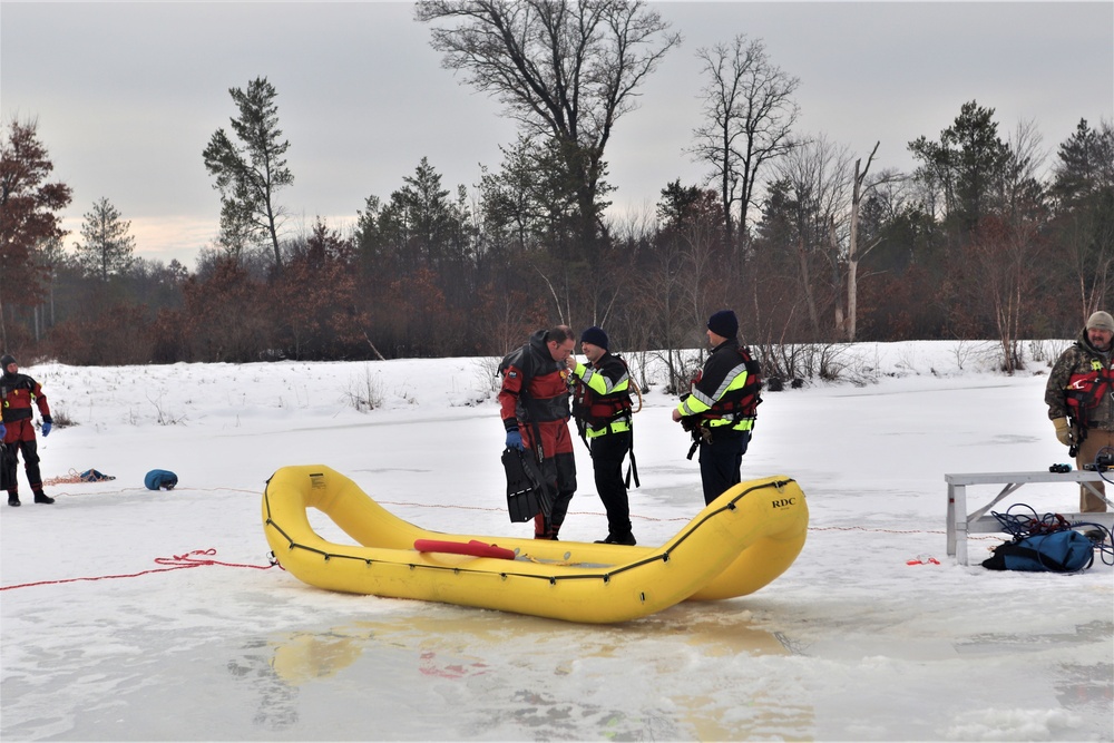 Fort McCoy Fire Department dive team conducts ice rescue training at frozen lake at Fort McCoy