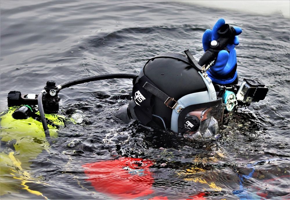 Fort McCoy Fire Department dive team conducts ice rescue training at frozen lake at Fort McCoy