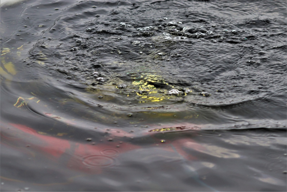 Fort McCoy Fire Department dive team conducts ice rescue training at frozen lake at Fort McCoy