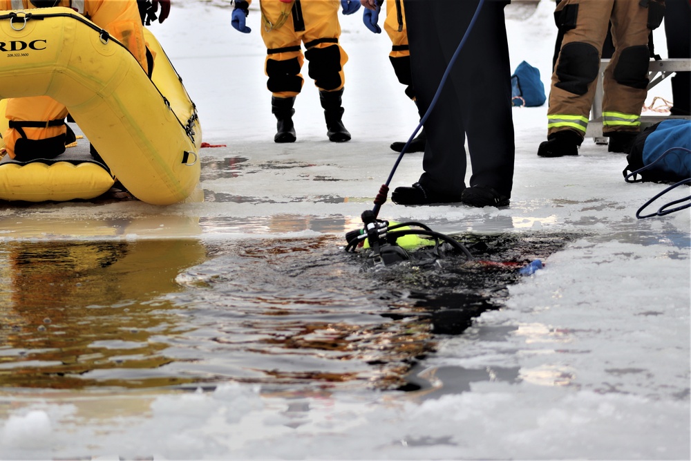 Fort McCoy Fire Department dive team conducts ice rescue training at frozen lake at Fort McCoy