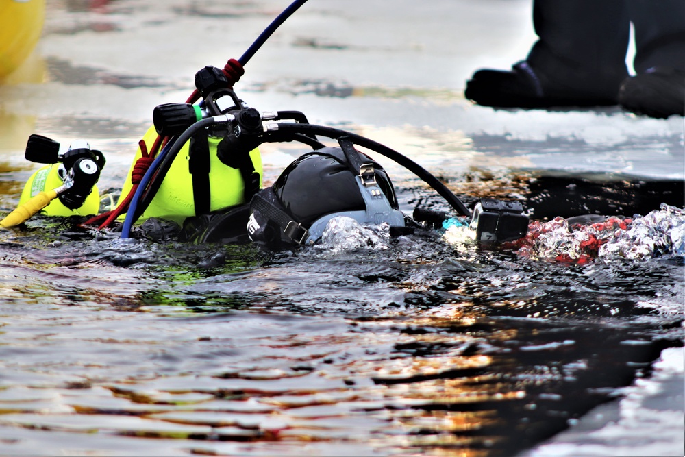 Fort McCoy Fire Department dive team conducts ice rescue training at frozen lake at Fort McCoy