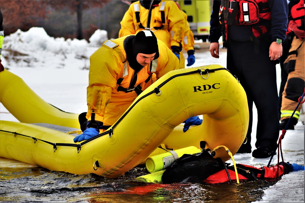 Fort McCoy Fire Department dive team conducts ice rescue training at frozen lake at Fort McCoy