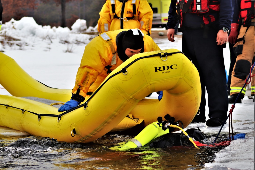 Fort McCoy Fire Department dive team conducts ice rescue training at frozen lake at Fort McCoy