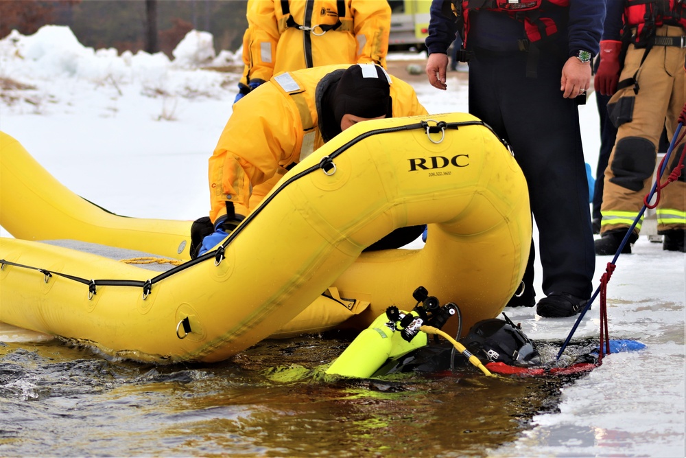 Fort McCoy Fire Department dive team conducts ice rescue training at frozen lake at Fort McCoy