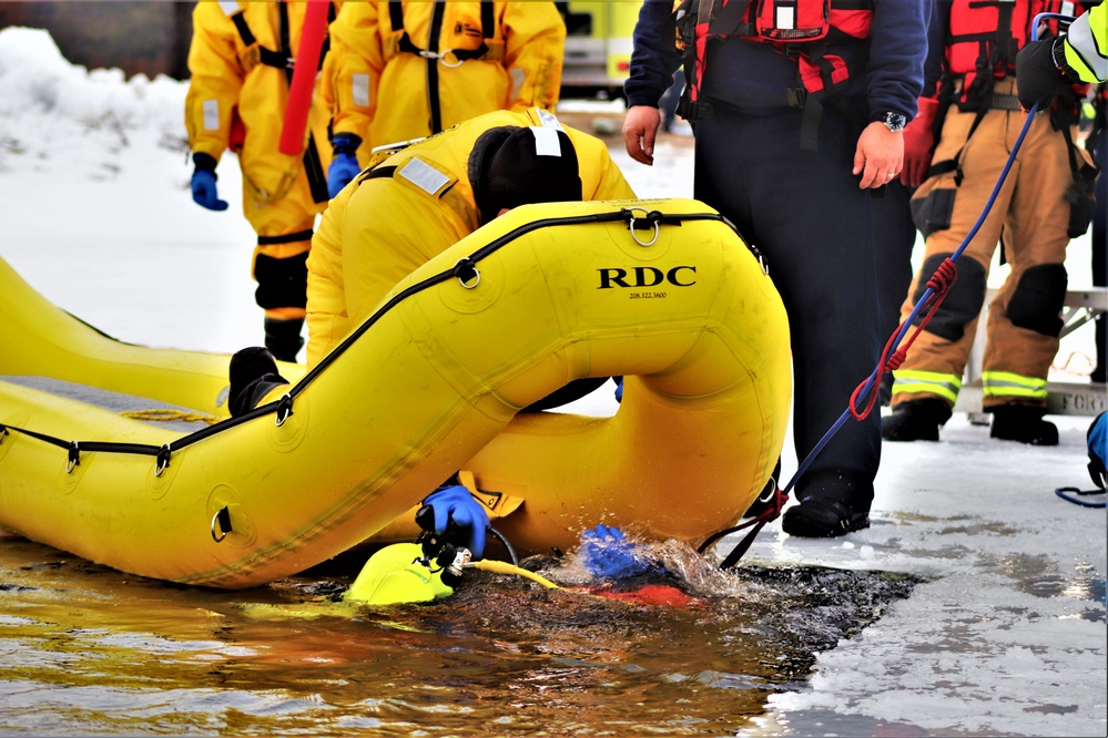 Fort McCoy Fire Department dive team conducts ice rescue training at frozen lake at Fort McCoy