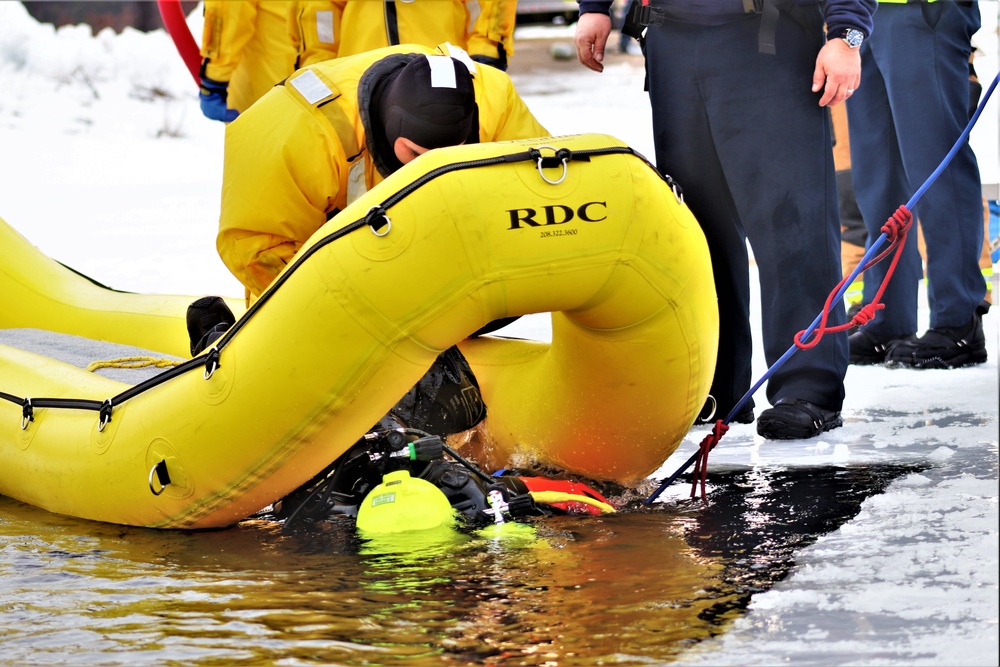 Fort McCoy Fire Department dive team conducts ice rescue training at frozen lake at Fort McCoy