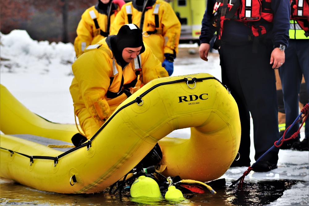 Fort McCoy Fire Department dive team conducts ice rescue training at frozen lake at Fort McCoy