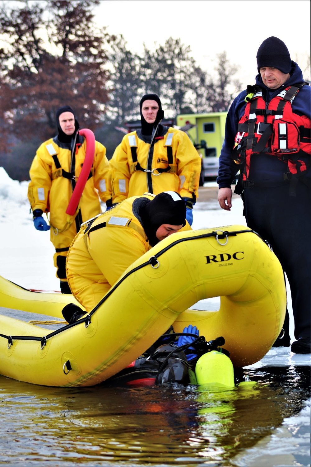 Fort McCoy Fire Department dive team conducts ice rescue training at frozen lake at Fort McCoy