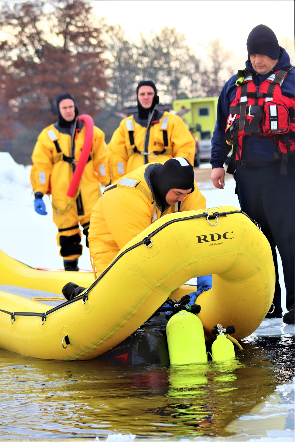 Fort McCoy Fire Department dive team conducts ice rescue training at frozen lake at Fort McCoy