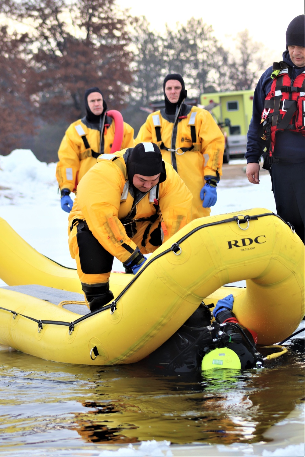 Fort McCoy Fire Department dive team conducts ice rescue training at frozen lake at Fort McCoy