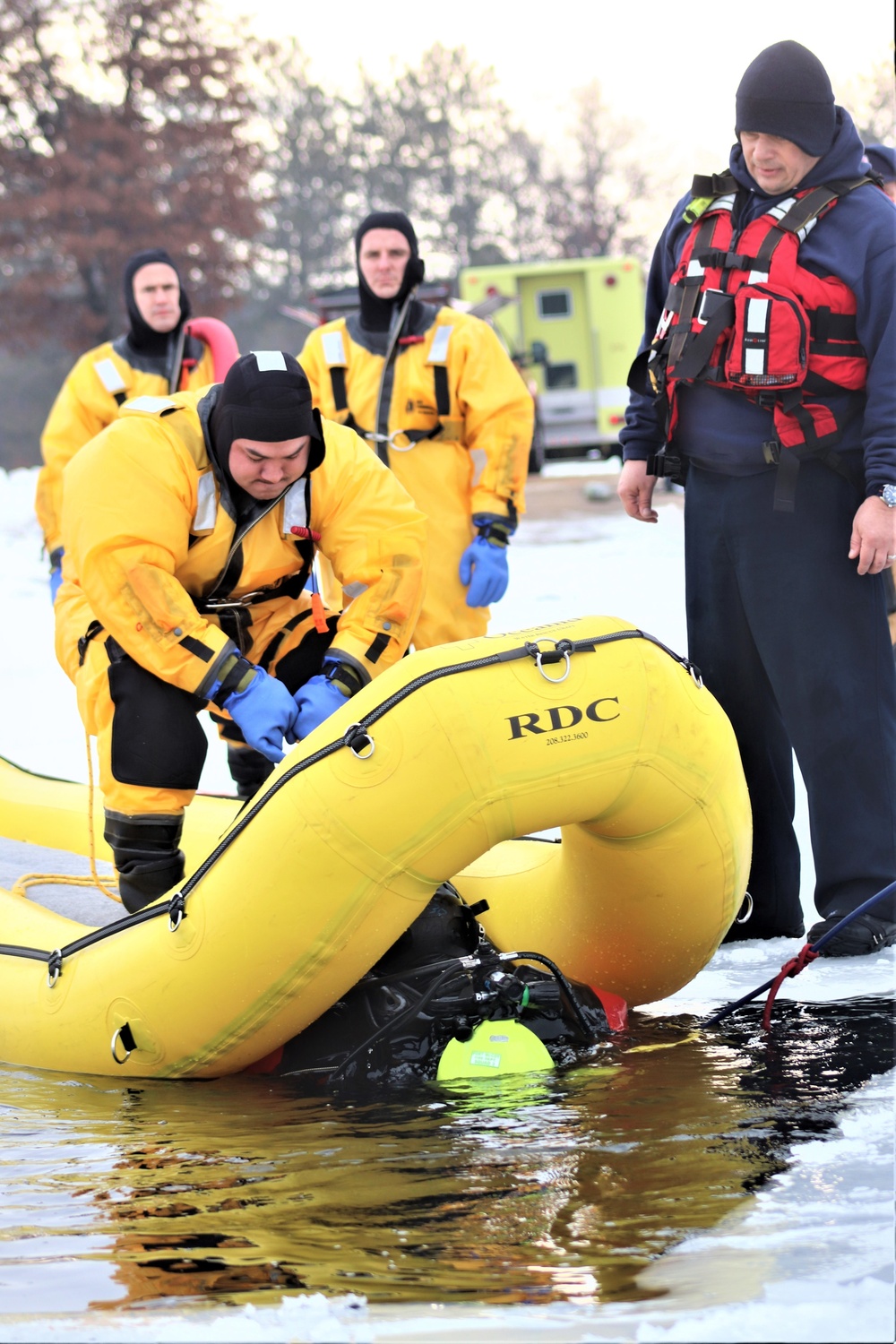 Fort McCoy Fire Department dive team conducts ice rescue training at frozen lake at Fort McCoy