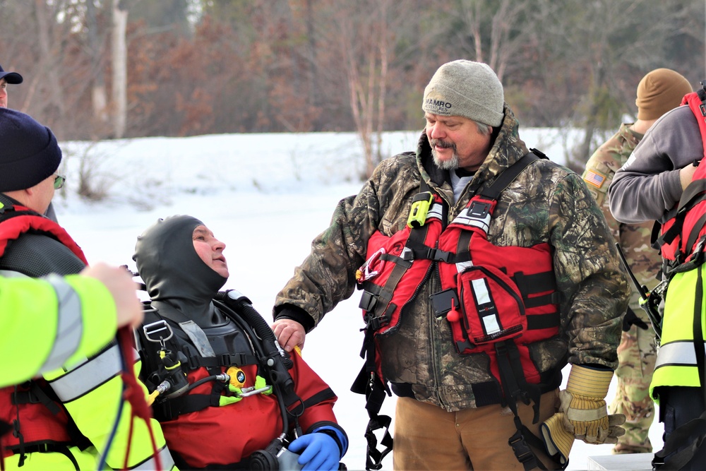 Fort McCoy Fire Department dive team conducts ice rescue training at frozen lake at Fort McCoy