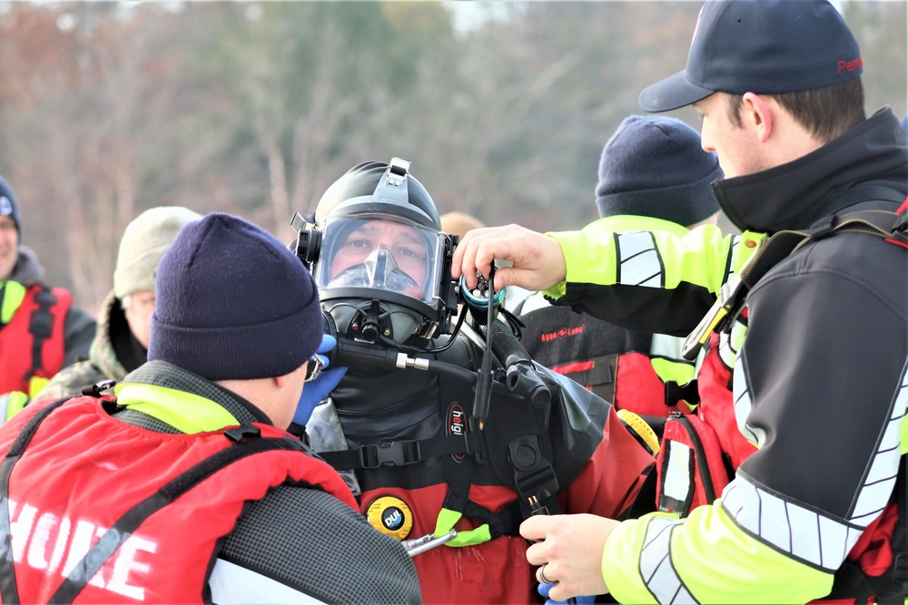 Fort McCoy Fire Department dive team conducts ice rescue training at frozen lake at Fort McCoy