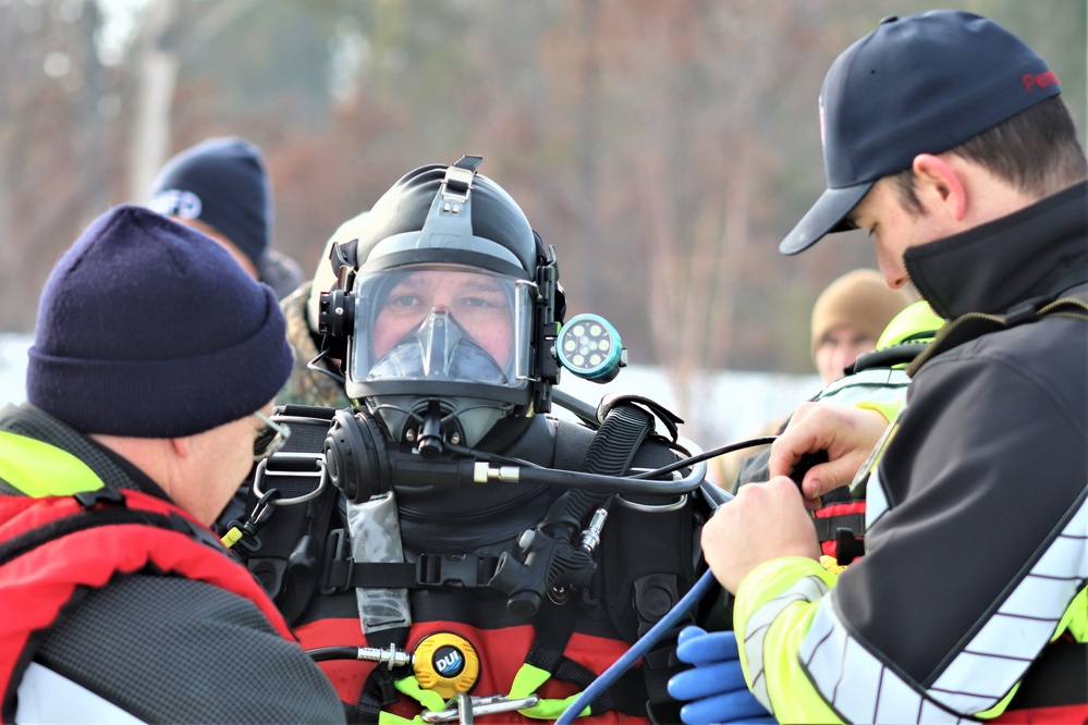 Fort McCoy Fire Department dive team conducts ice rescue training at frozen lake at Fort McCoy