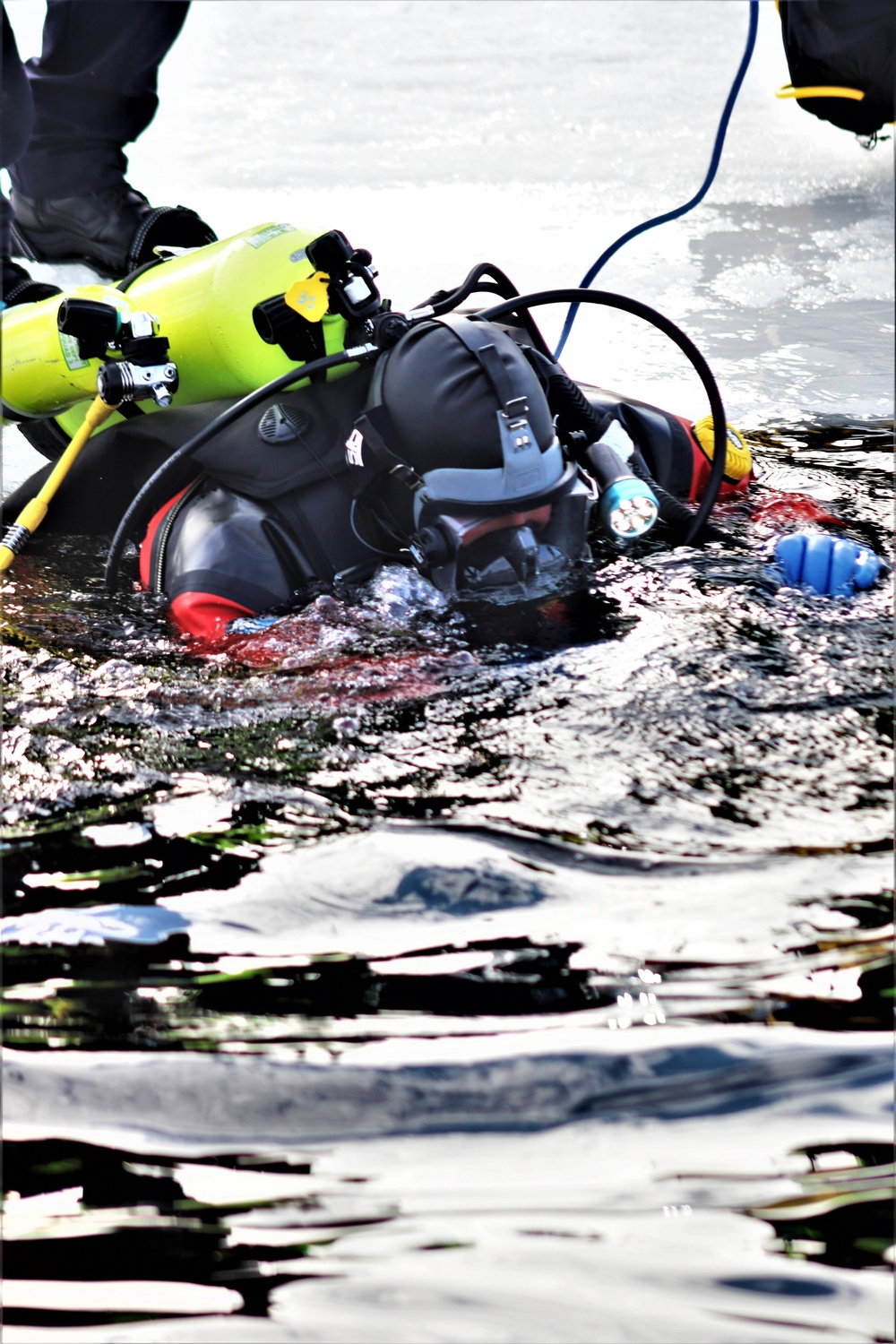 Fort McCoy Fire Department dive team conducts ice rescue training at frozen lake at Fort McCoy