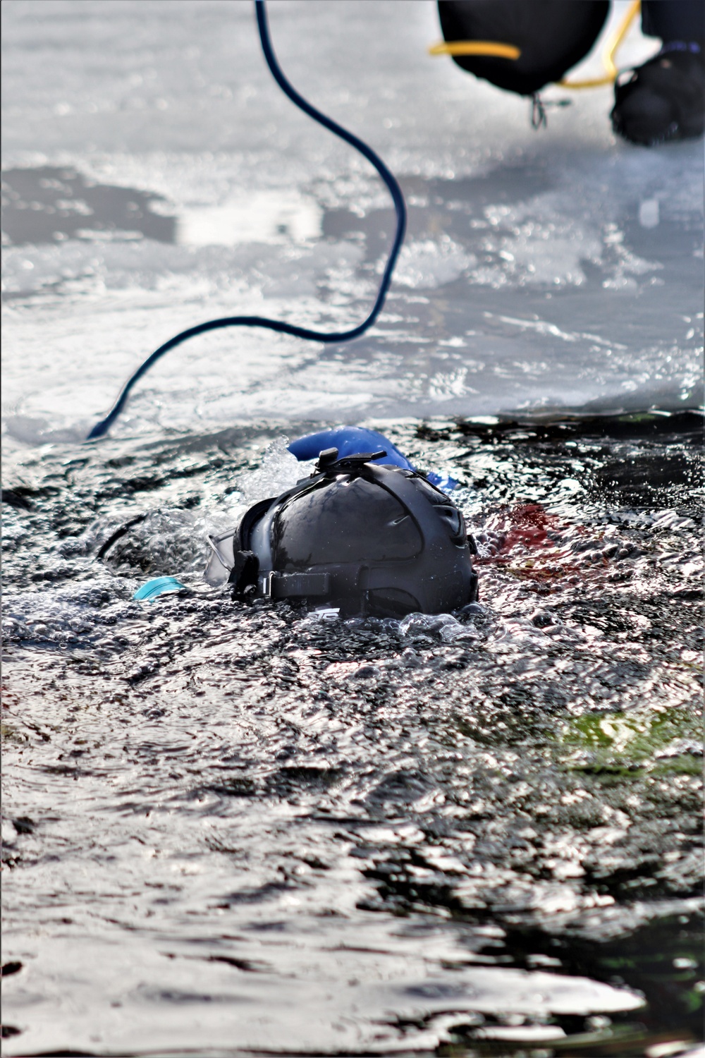 Fort McCoy Fire Department dive team conducts ice rescue training at frozen lake at Fort McCoy