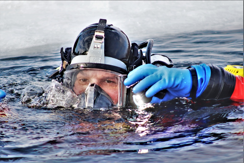 Fort McCoy Fire Department dive team conducts ice rescue training at frozen lake at Fort McCoy