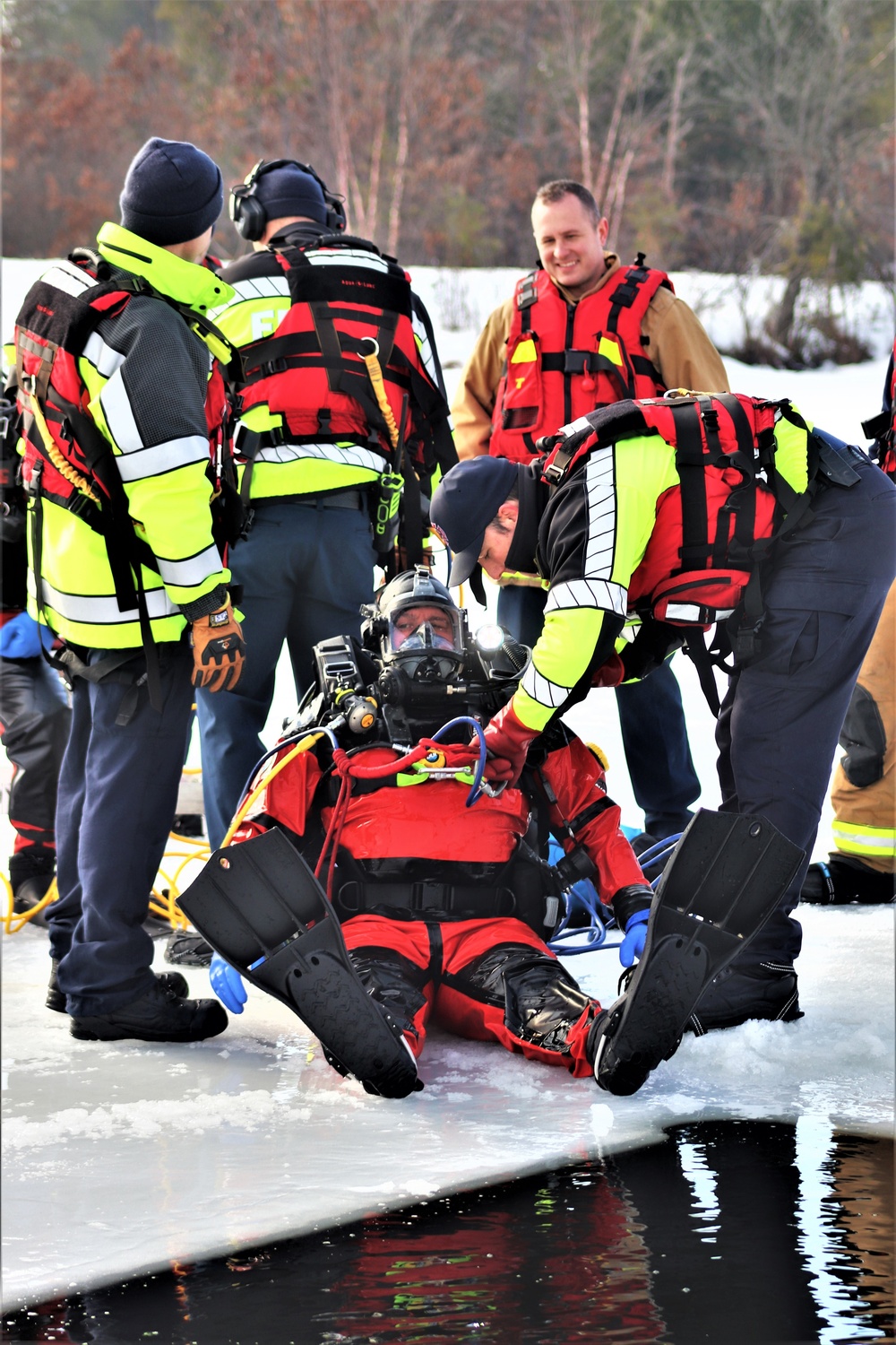 Fort McCoy Fire Department dive team conducts ice rescue training at frozen lake at Fort McCoy