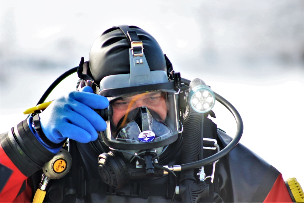 Fort McCoy Fire Department dive team conducts ice rescue training at frozen lake at Fort McCoy