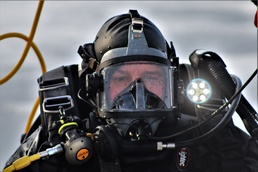 Fort McCoy Fire Department dive team conducts ice rescue training at frozen lake at Fort McCoy